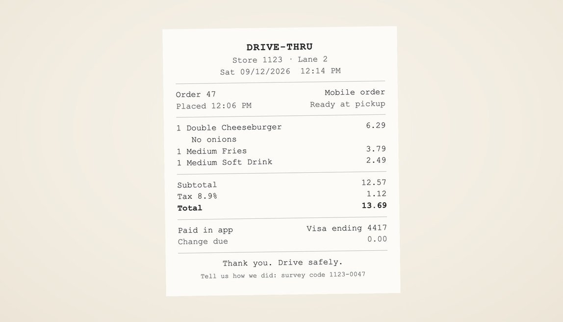 A drive-thru receipt for a mobile order: a double cheeseburger, medium fries, and a medium soft drink, total $13.69